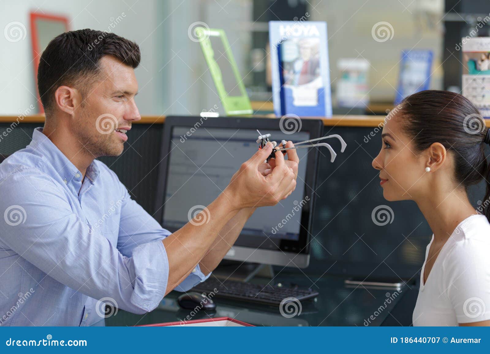 Optician Putting Testing Glasses on To Patient Stock Image Image of