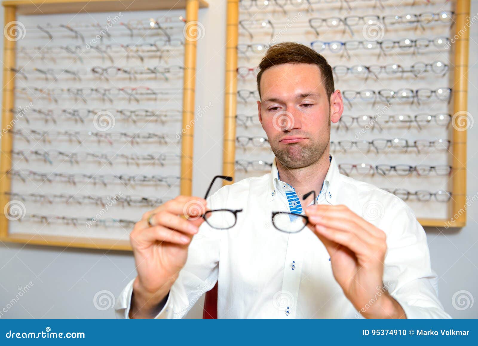 In Optician Shop- Young Man with Broken Glasses Stock Photo - Image of ...