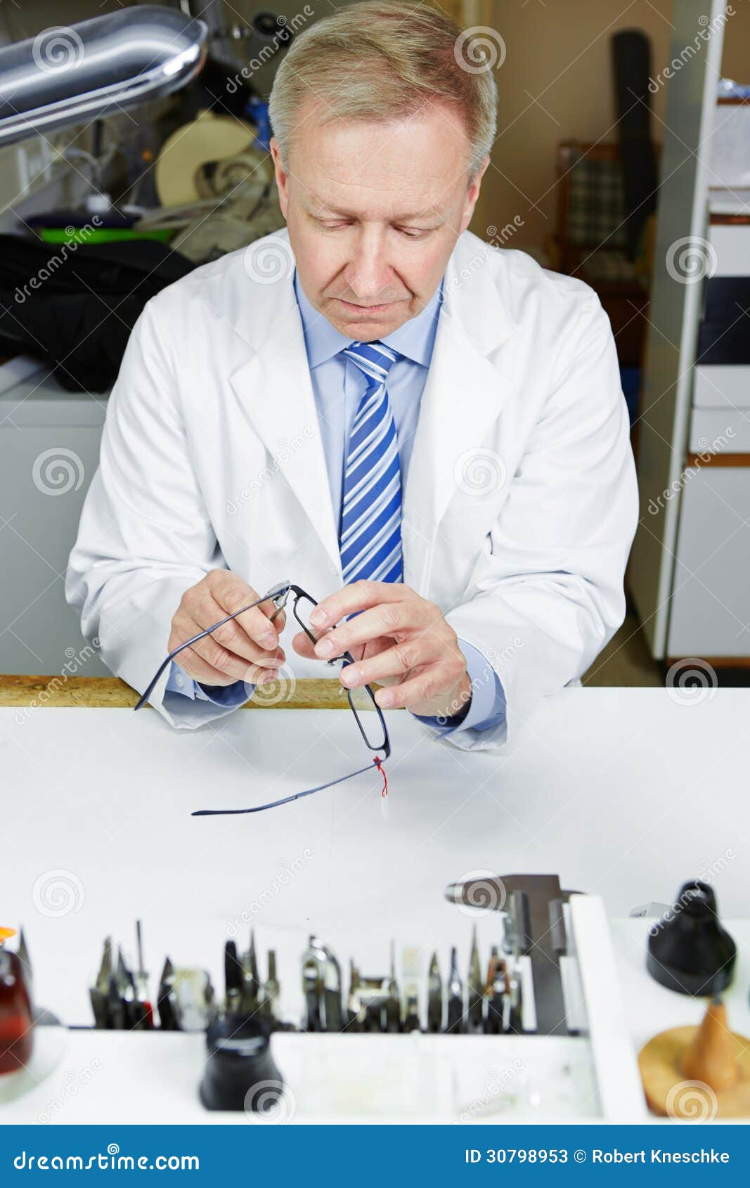 Optician in Fixing Glasses Stock Image Image of optics