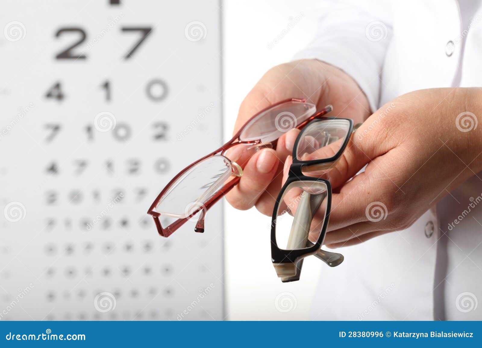 Optometrist with glasses stock photo. Image of examination 28380996