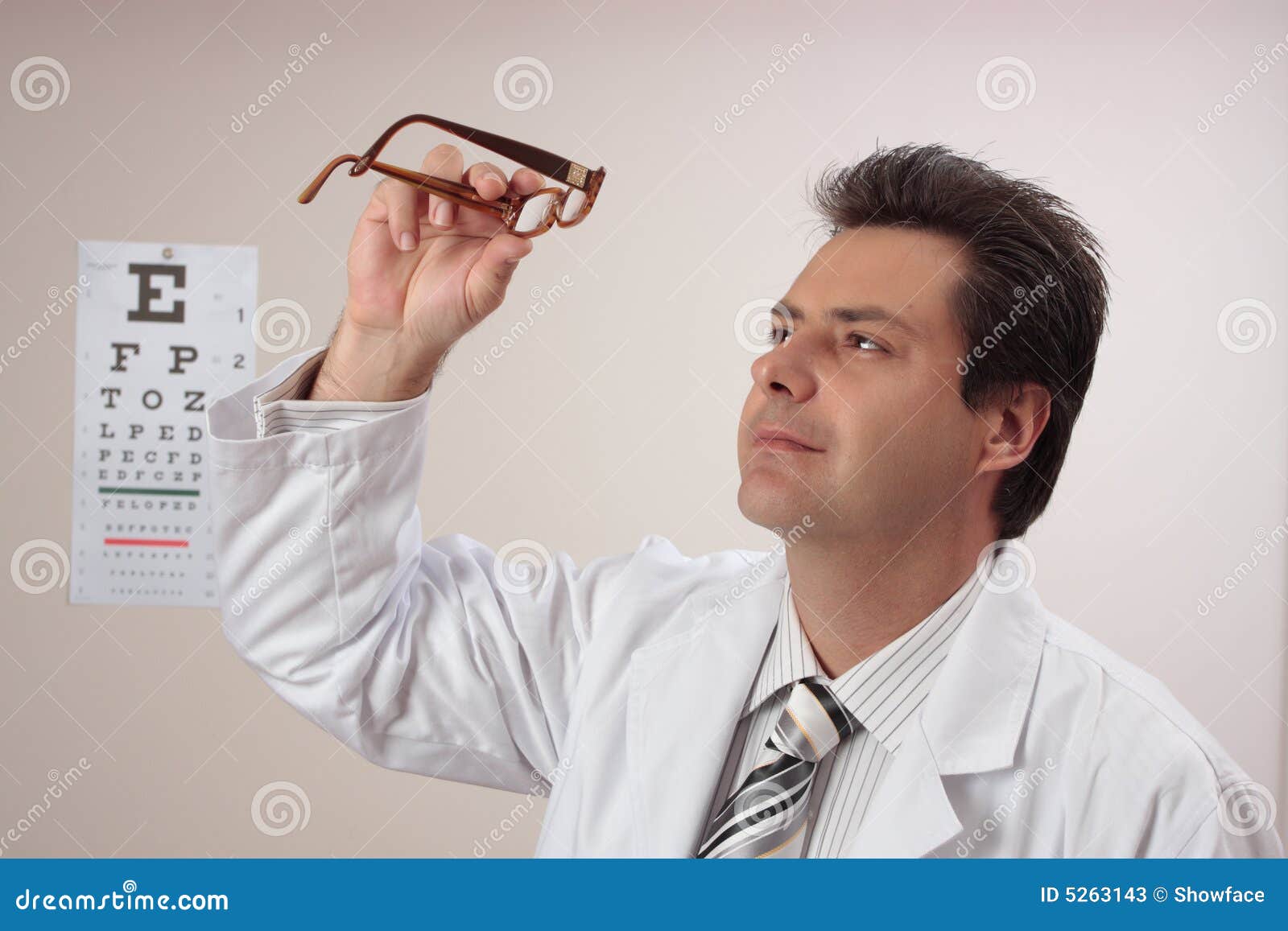 Optometrist Inspects Eye Glasses Stock Image Image of people, looking