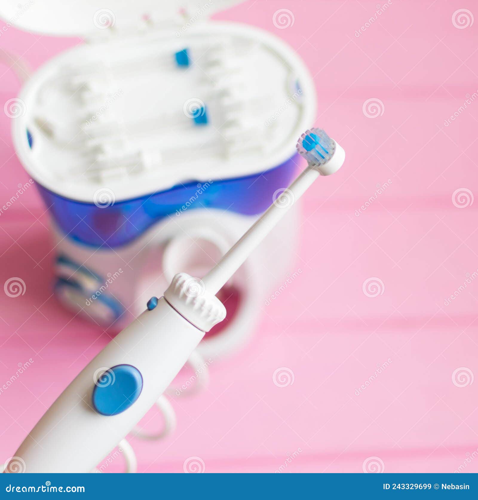 Oral Hygiene. Irrigator for Cleaning Teeth on a Pink Background Stock Image Image of irrigate