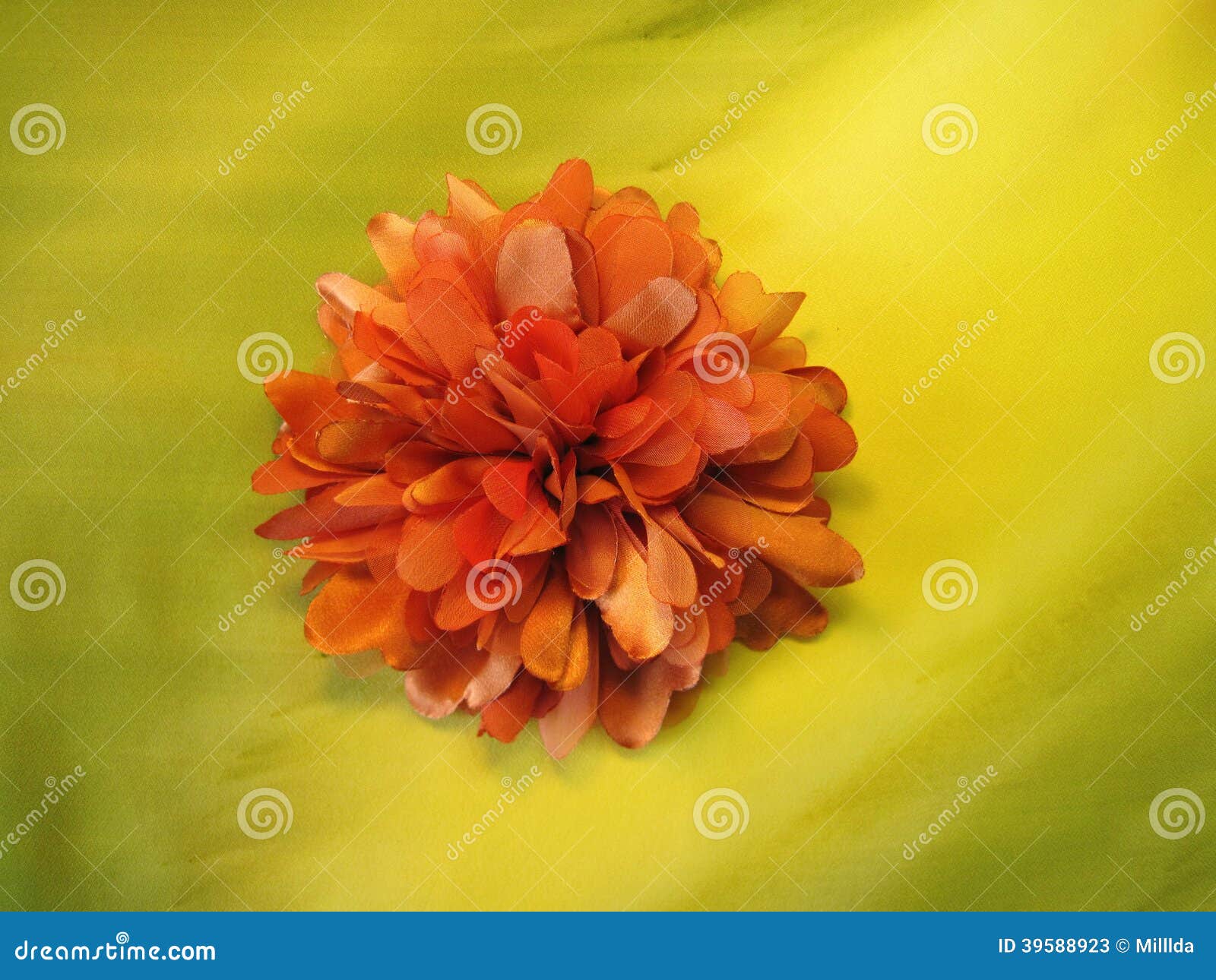Orange artificial flower stock image. Image of hand, closeup 39588923