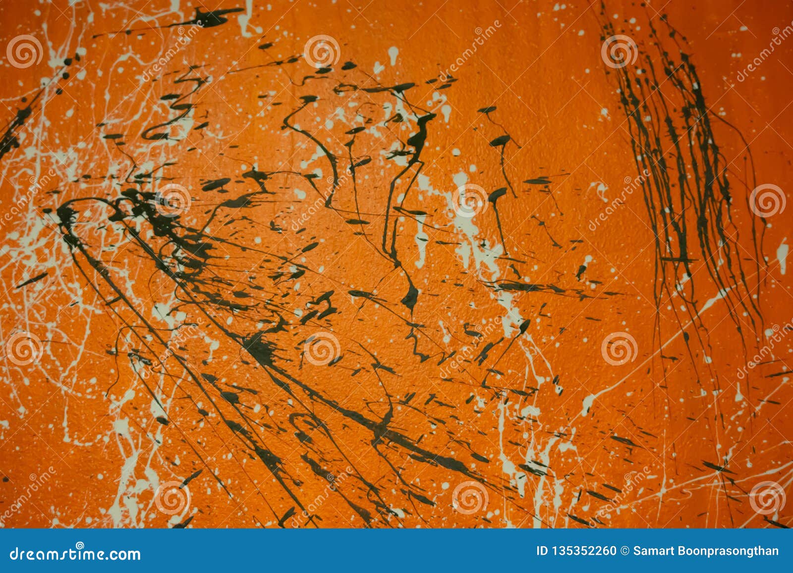 Orange Cement Wall with Dripping Paint Stains Used As Background Stock