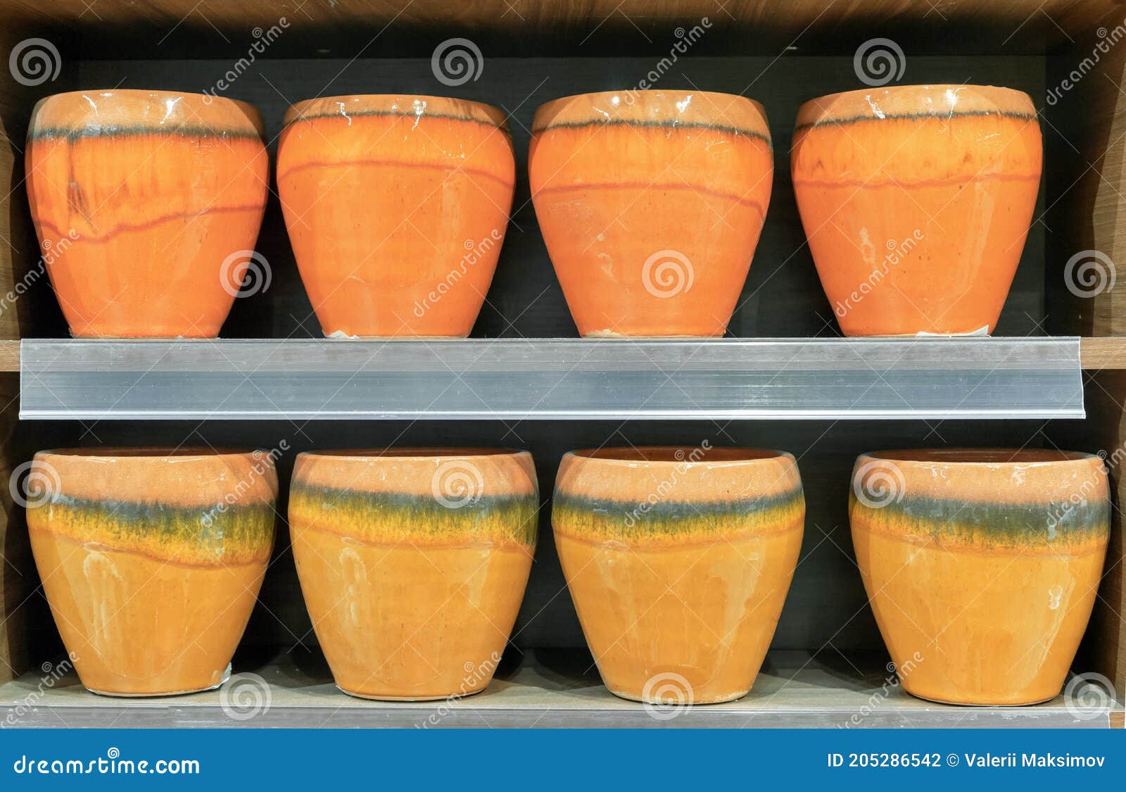 Orange Ceramic Flower Pots in a Flower Shop Window Stock Photo Image