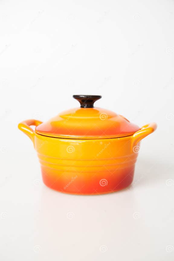 Orange cooking pot stock image. Image of culinary, colourful 30364409