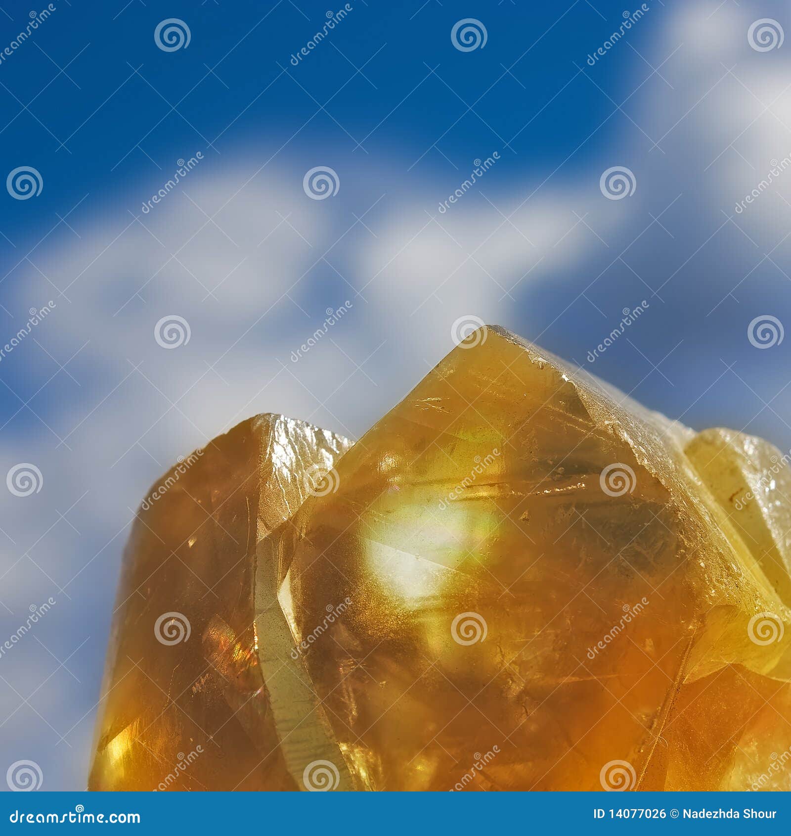 orange crystalls on blue sky background