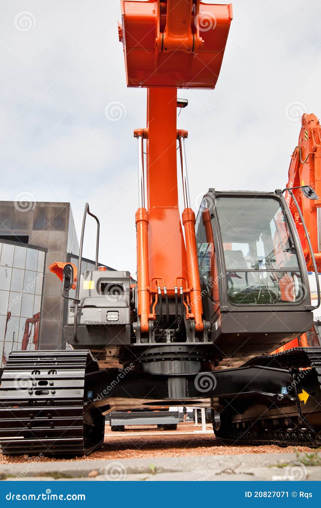 Orange diesel excavator editorial photo. Image of track 20827071