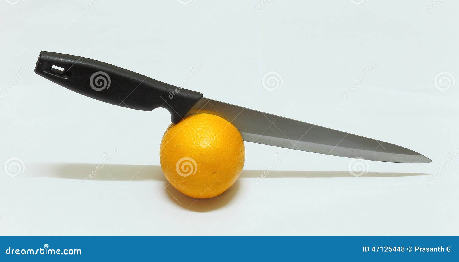 Orange fruit cut by knife stock photo. Image of fruit 47125448
