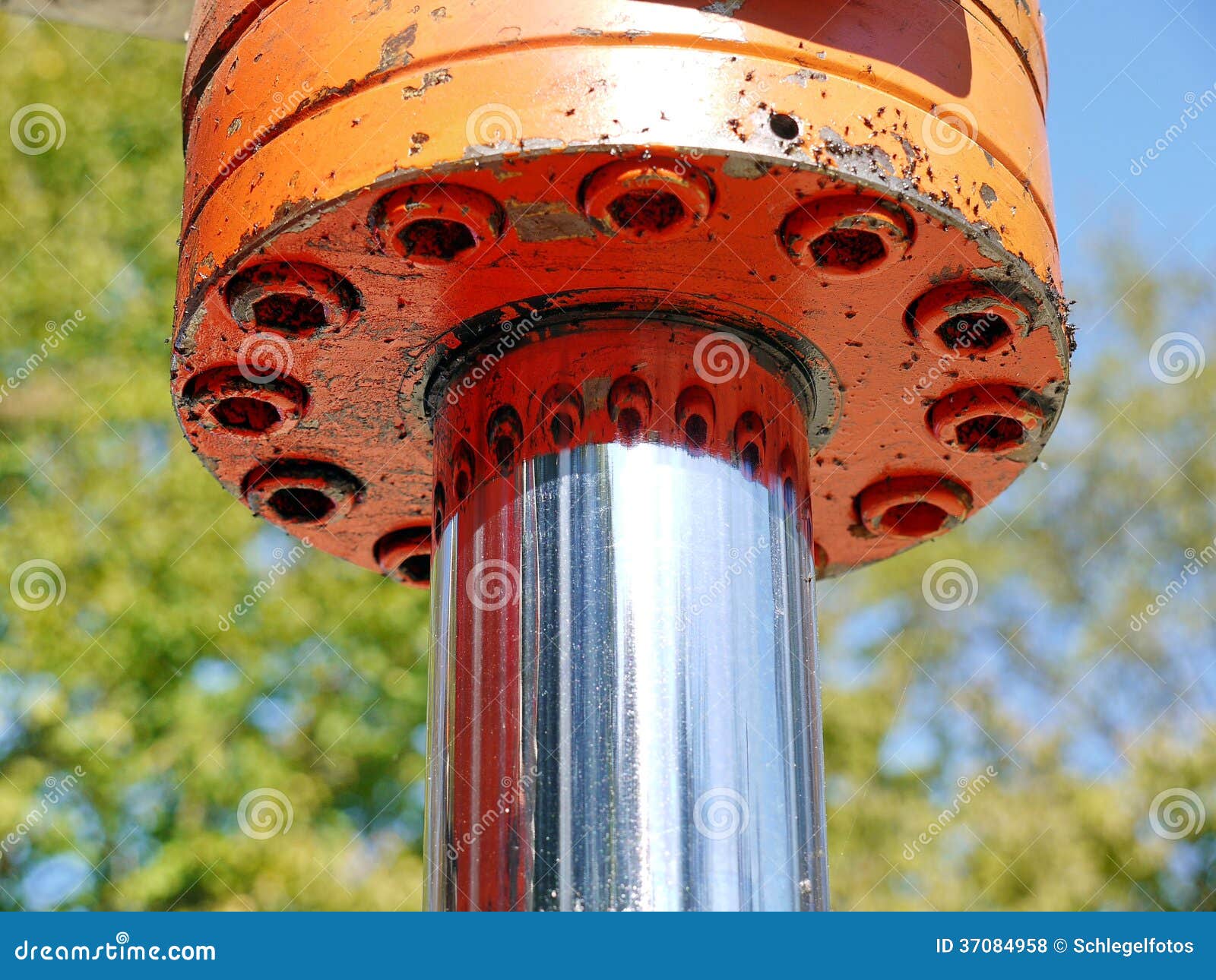 Orange hydraulic cylinder stock photo. Image of heavy 37084958