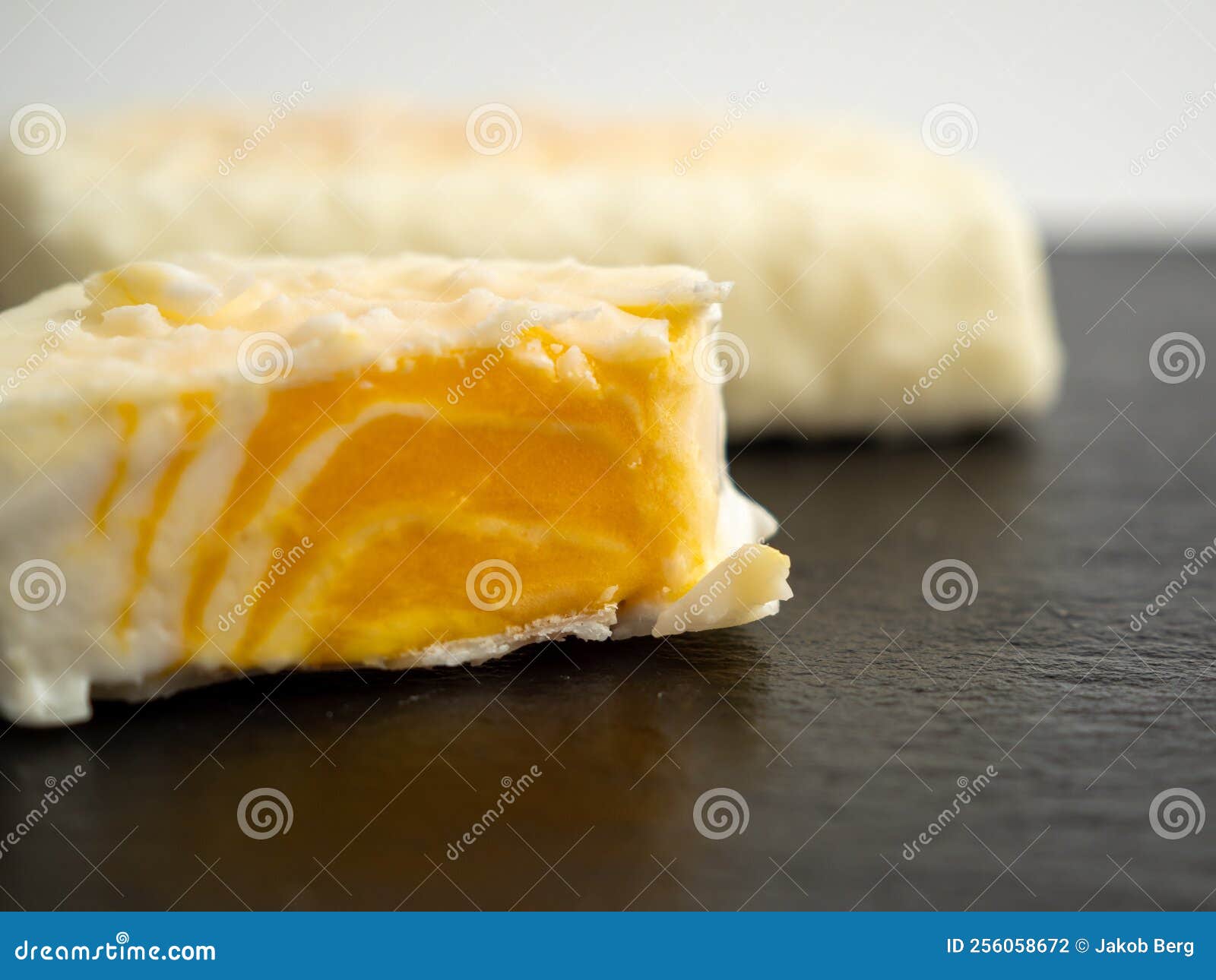 Orange Ice Cream with White Milk Chocolate. Stock Photo Image of