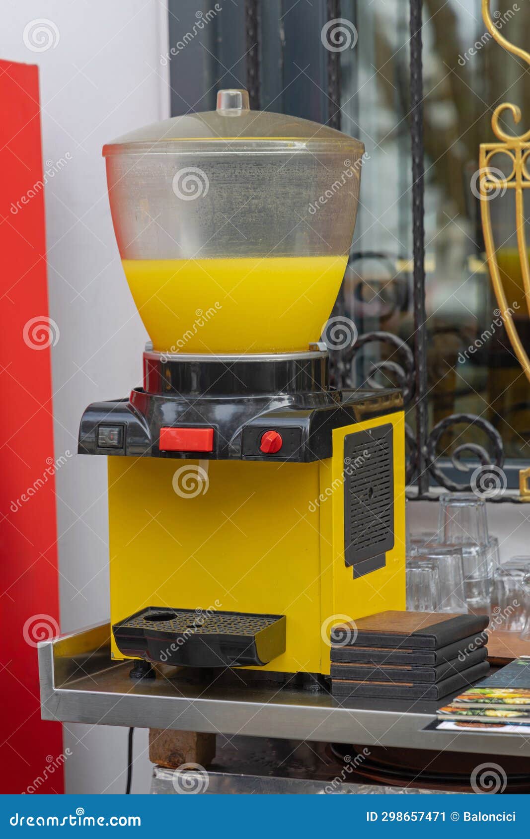 Orange Juice Dispenser stock image. Image of europe 298657471