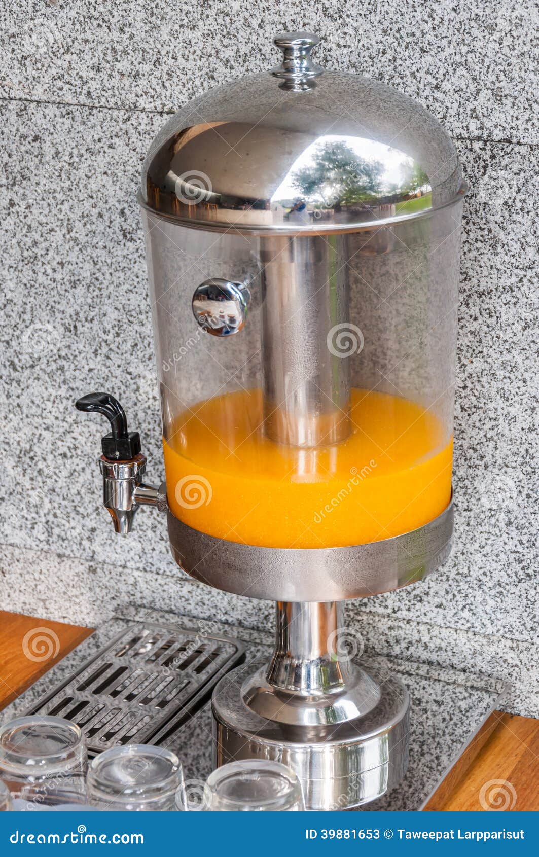 Orange juice in dispensers stock image. Image of cool 39881653