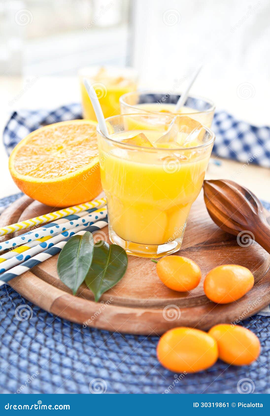 Orange juice and kumquats stock image. Image of leaf 30319861