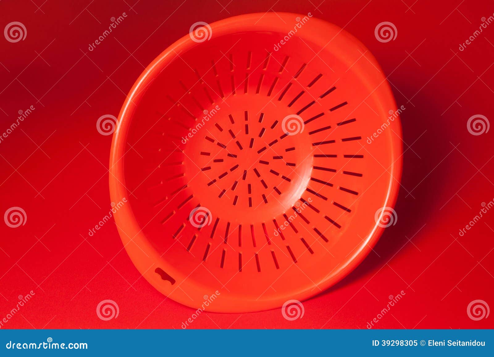 Orange kitchen strainer stock image. Image of domestic 39298305