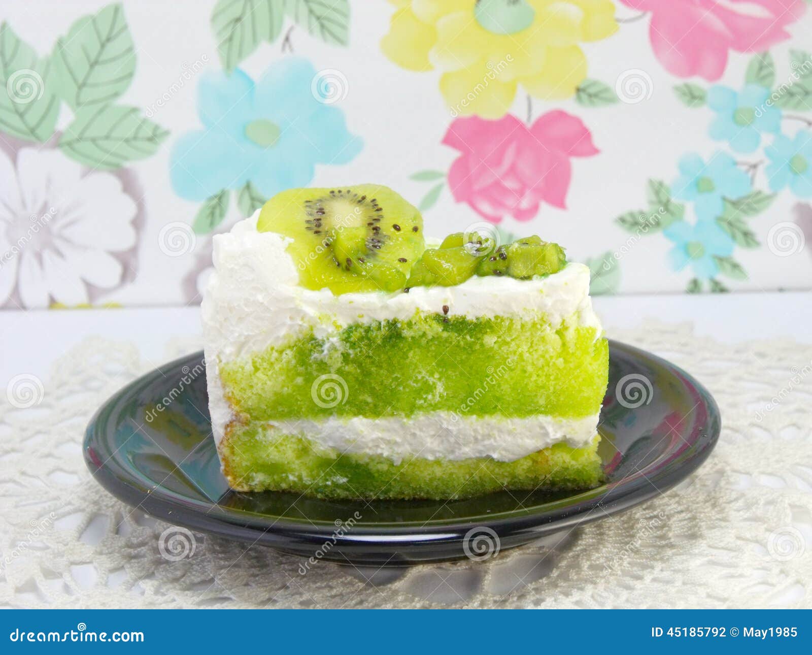 Orange and kiwi layer cake stock photo. Image of plate 45185792