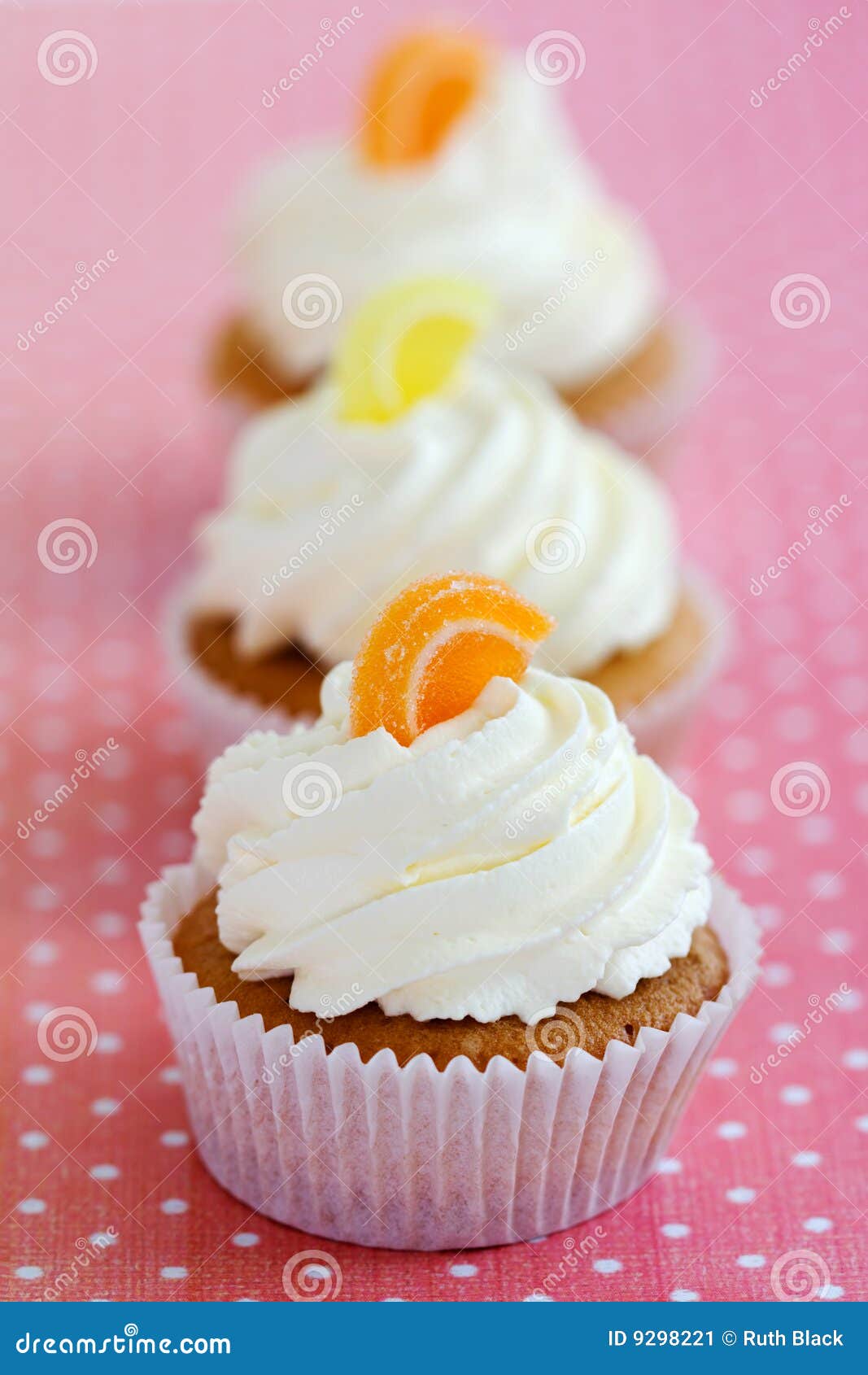 Orange and lemon cupcakes stock image. Image of orange 9298221