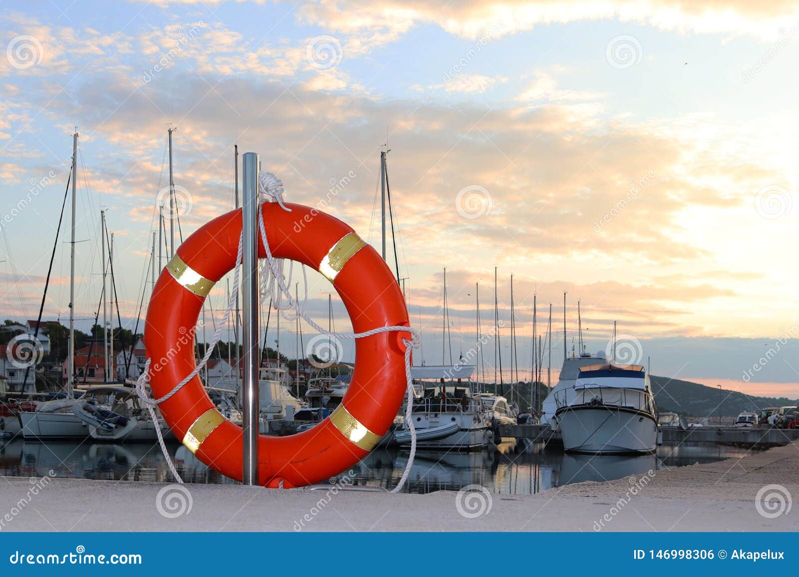 Orange Life Ring on the Pier in the Croatian Marina Against the ...