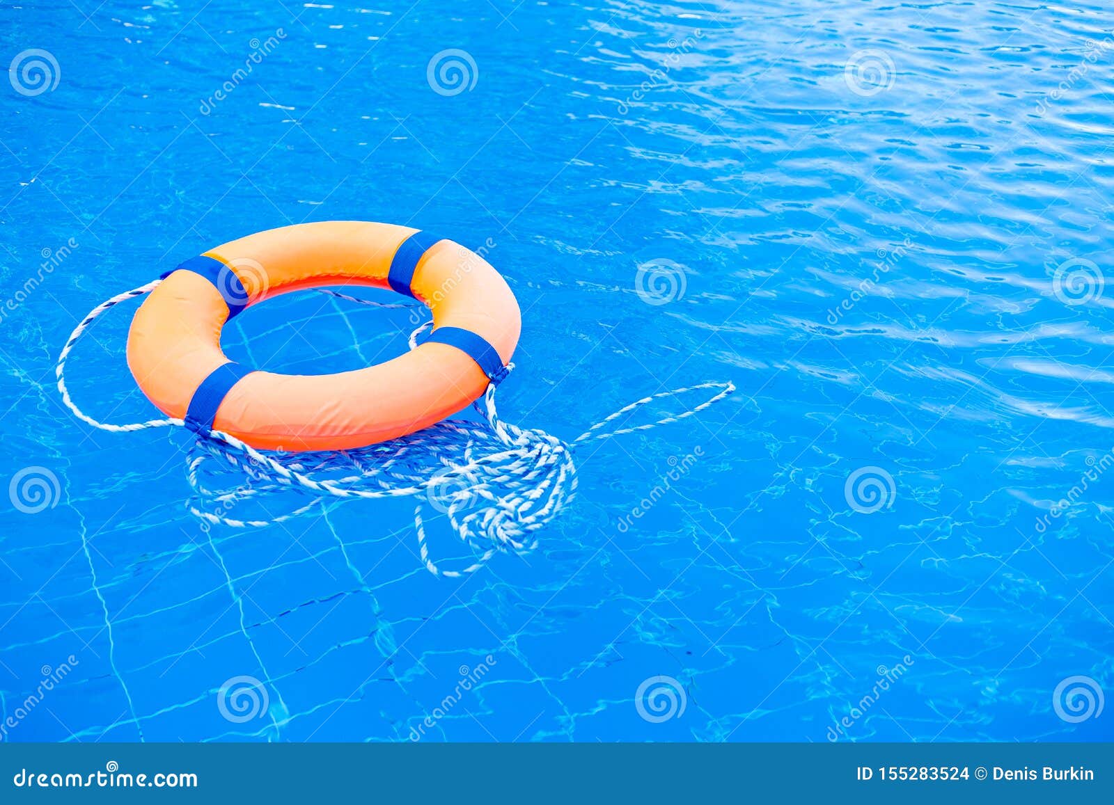 Premium Photo | Inflatable swim ring floating in pool splashes and drops on  the water summer time premium photo