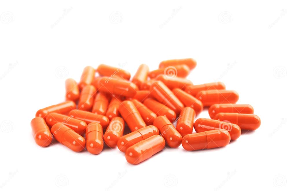 Orange pill capsules stock photo. Image of background 35050480