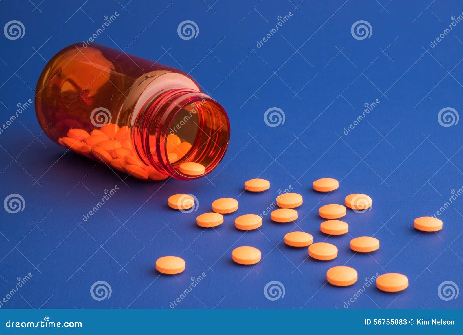 Orange Pills Spilling Out of Orange Bottle Stock Image Image of