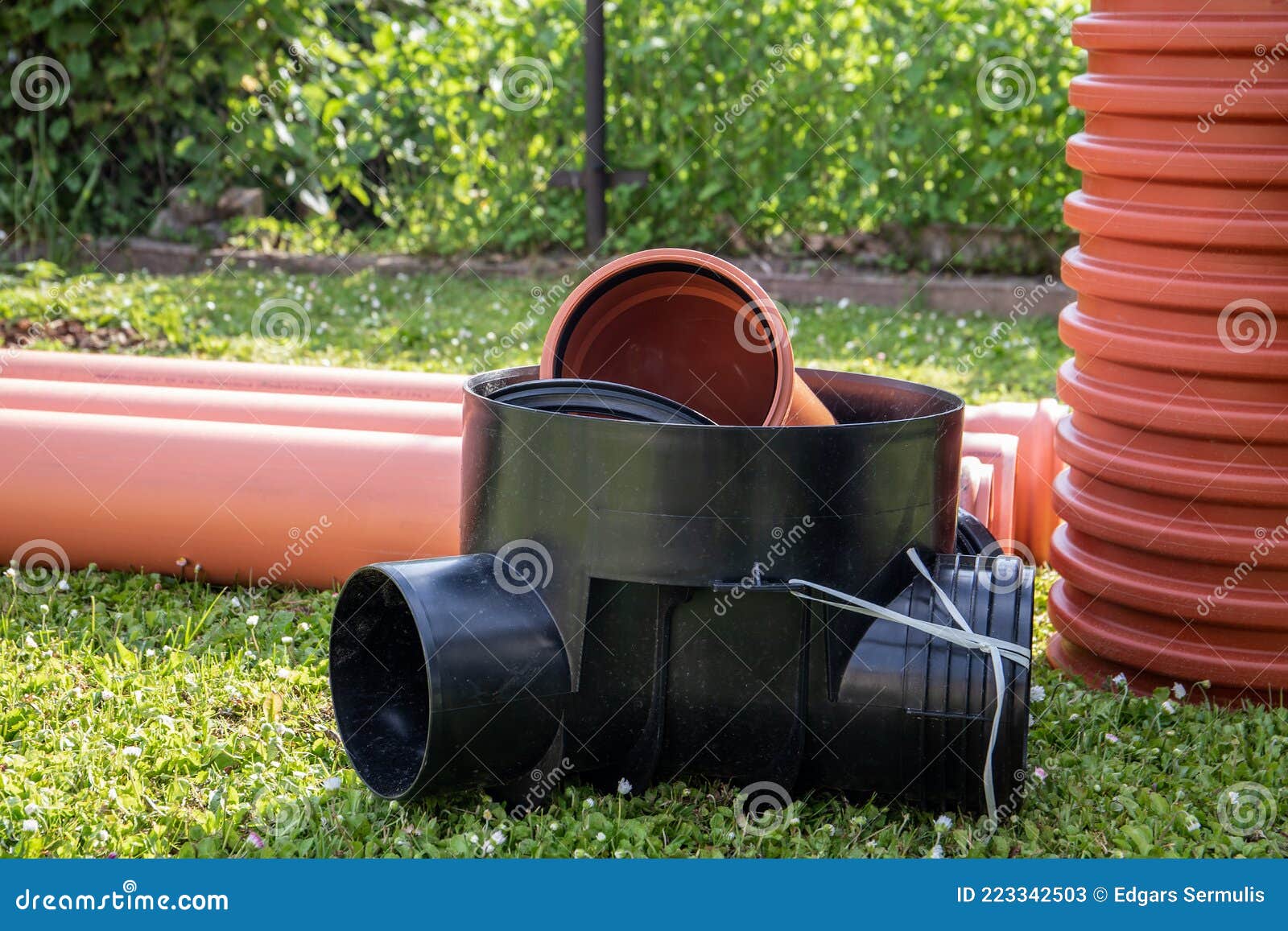 Orange Plastic Sewer Pipes. Reconstruction and Installation Stock Image