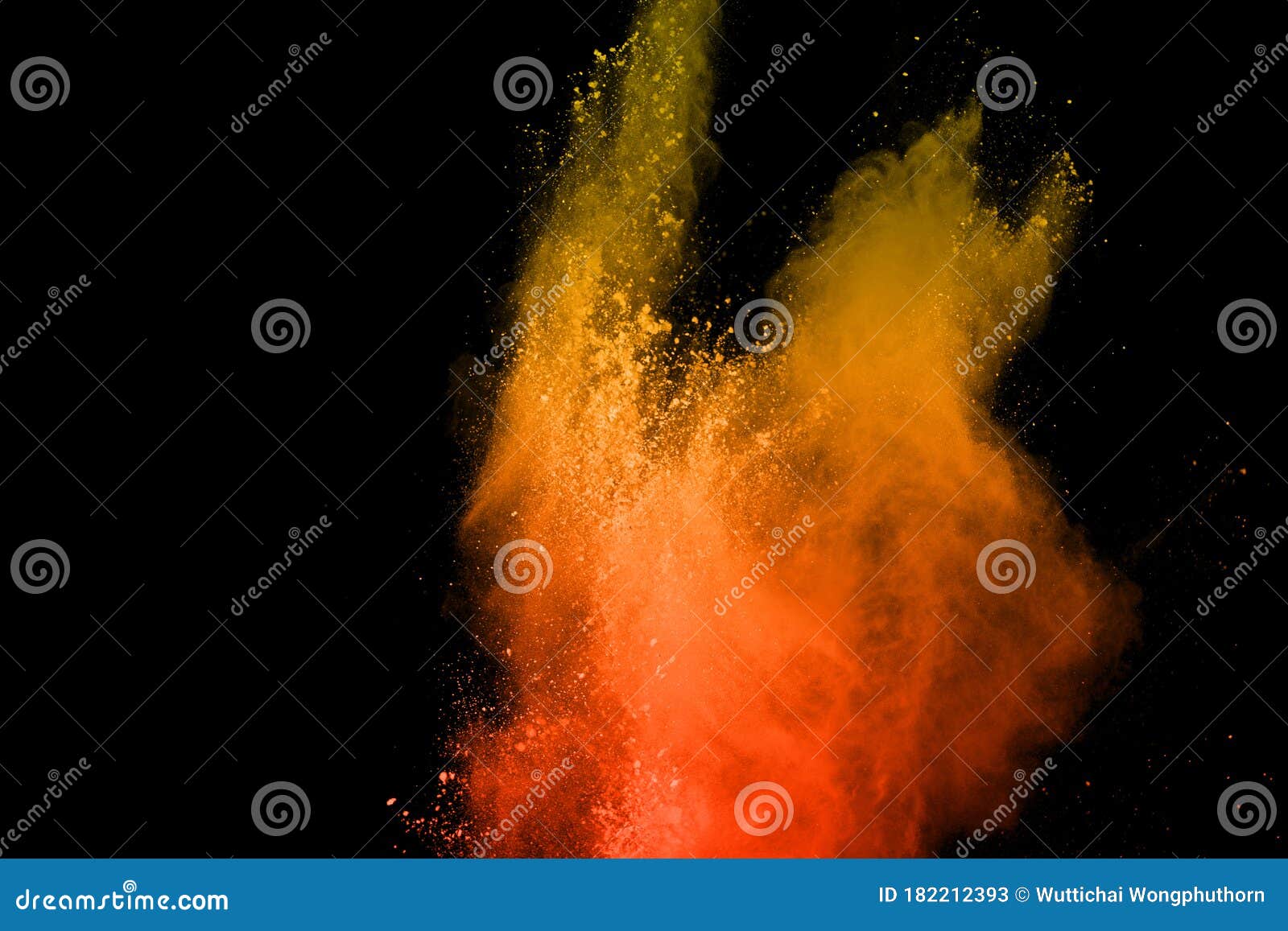 Orange Powder Explosion Isolated on Black Background.Colored Dust