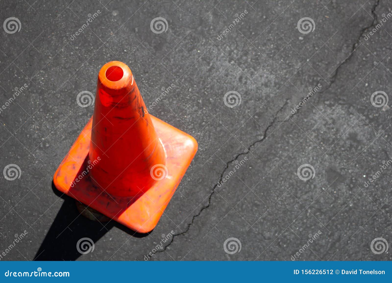 Orange pylon in the street stock photo. Image of signal 156226512