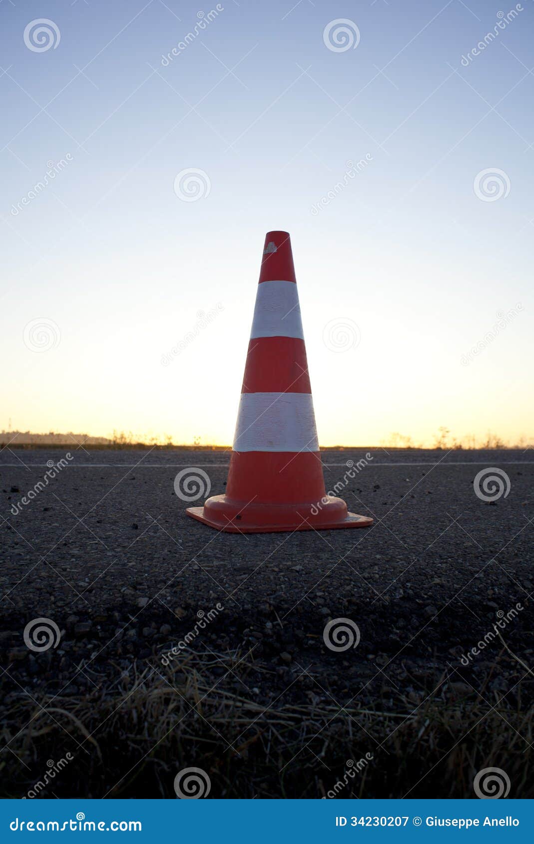 Orange road cone stock image. Image of asphalt, glow 34230207