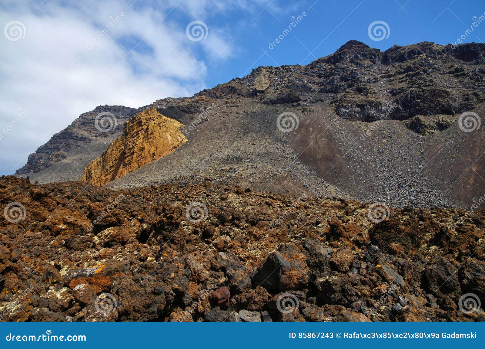 orange rocks and black lava, el hierro