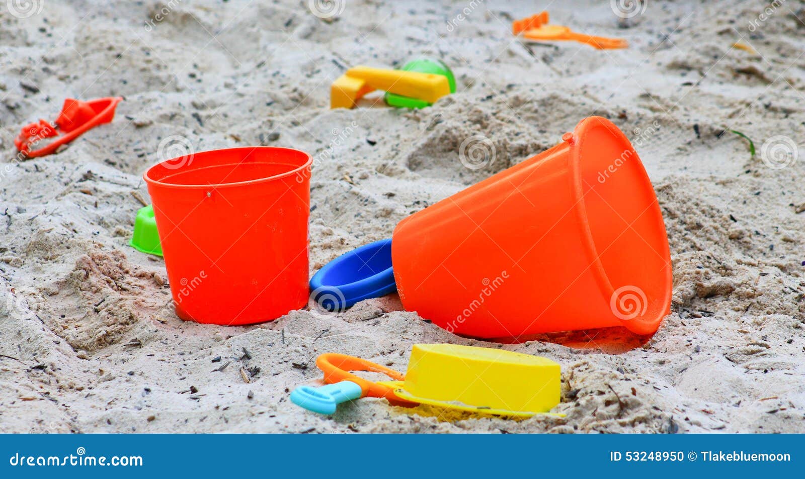 Orange sand buckets stock photo. Image of castle, toys 53248950