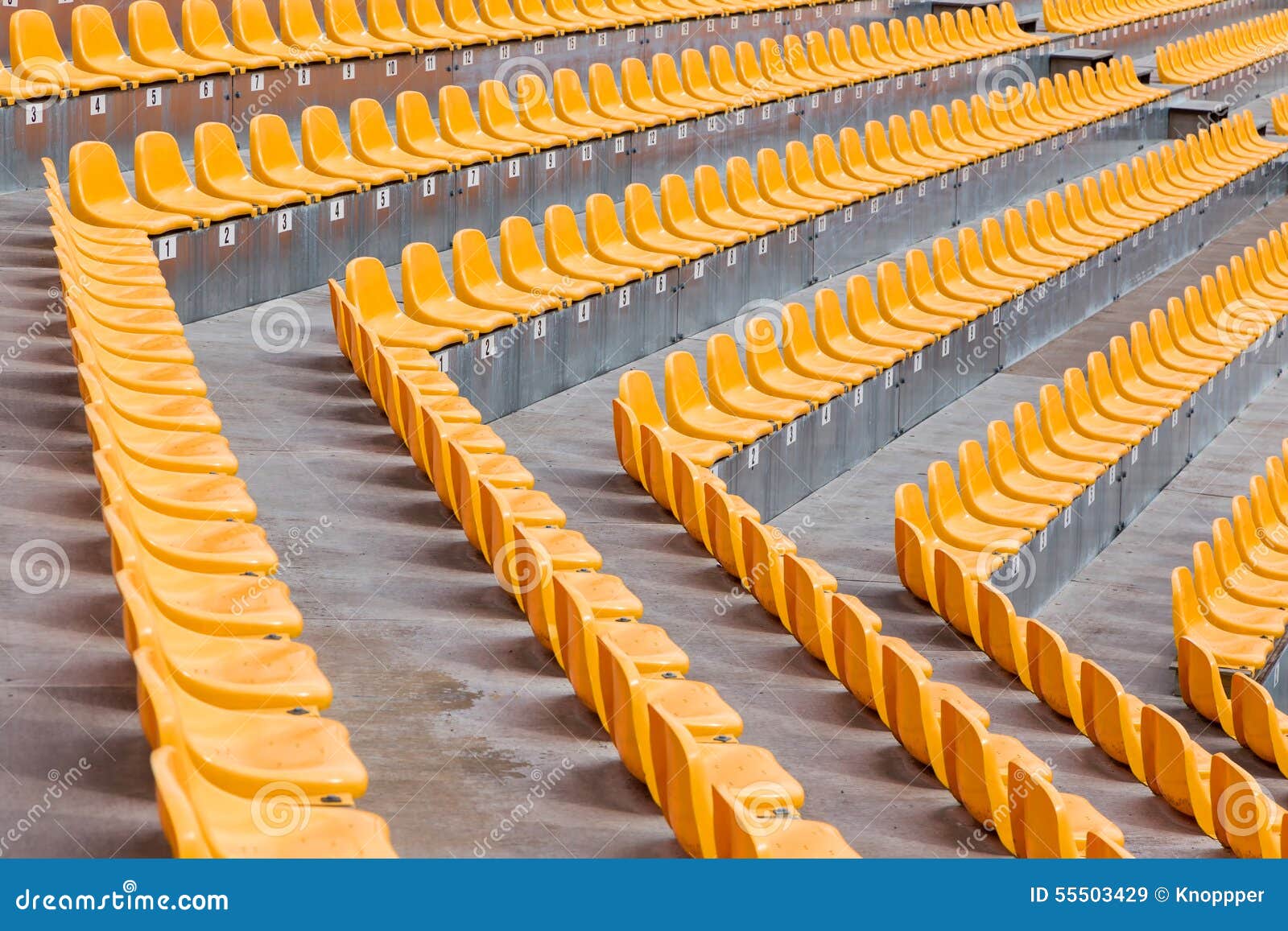Orange seats stock image. Image of perspective, color - 55503429
