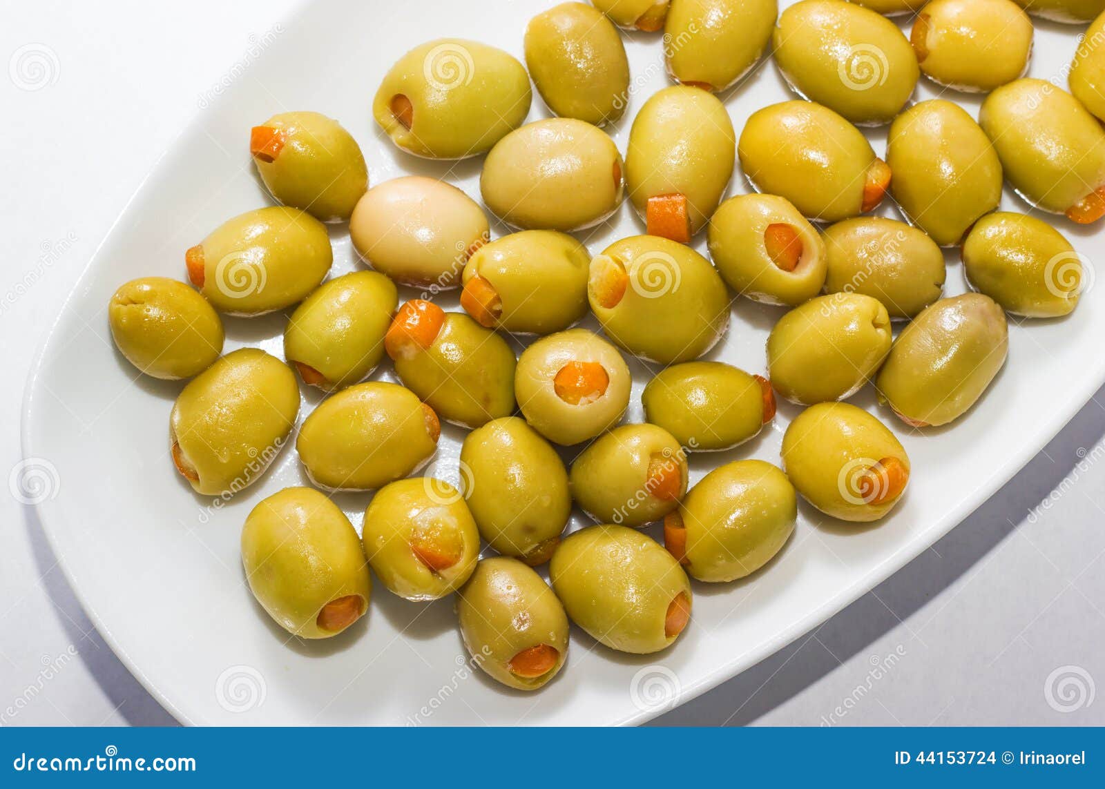 Orange Stuffed olives stock photo. Image of drink, green 44153724