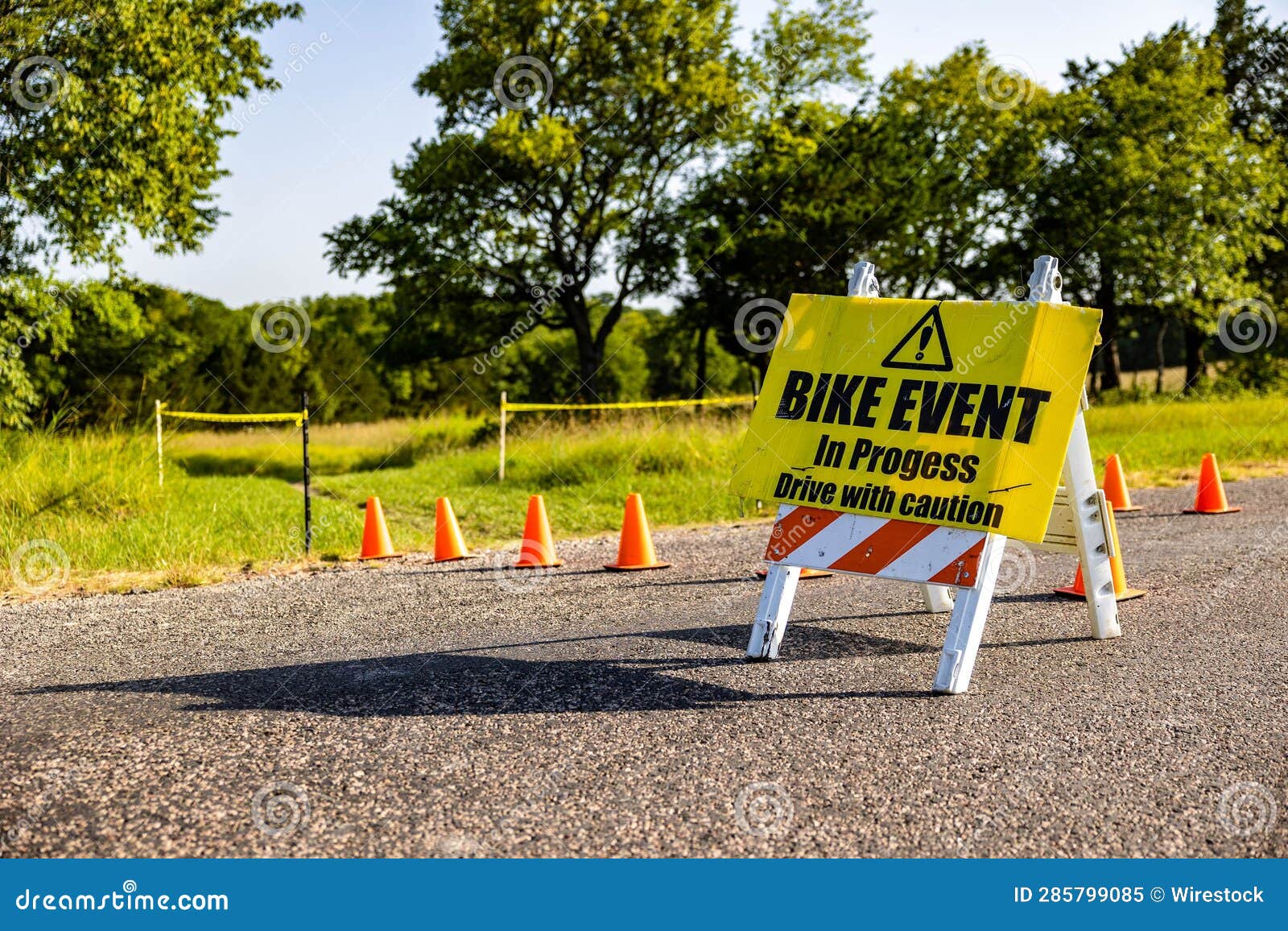 Orange Traffic Cones and a Warning Sign on the Road Stock Image Image