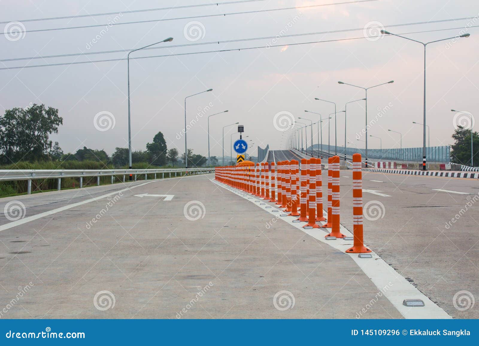 The Orange Traffic Pole or Flexible Traffic Bollard on Asphalt Road for ...