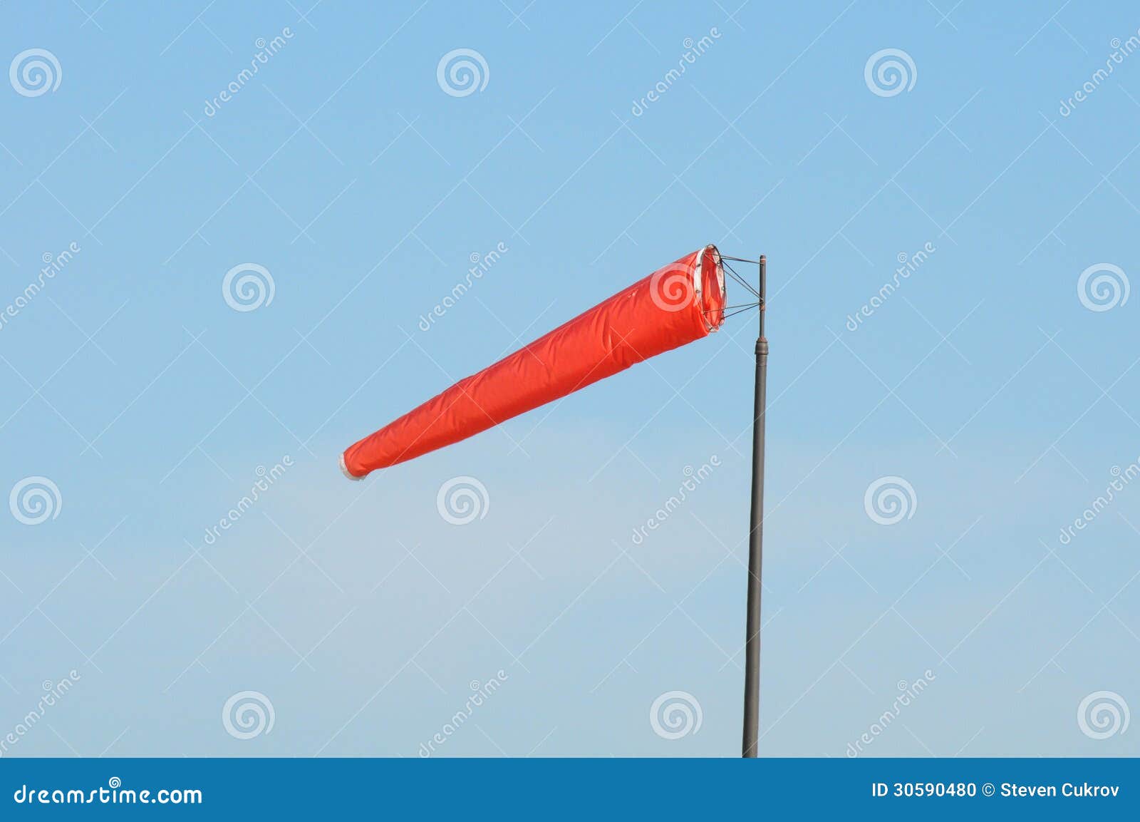 Orange Windsock Against Blue Sky Stock Photo Image of bright, wind