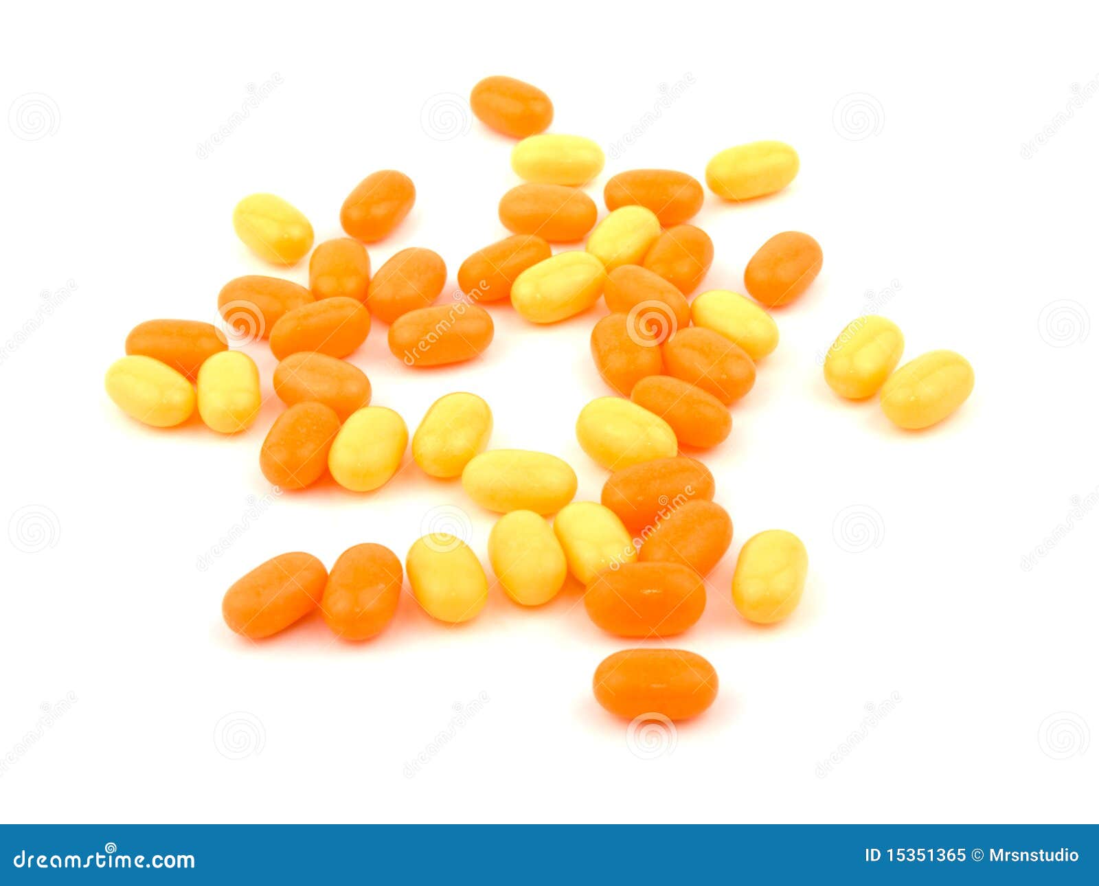 Orange and yellow candies stock image. Image of candy 15351365