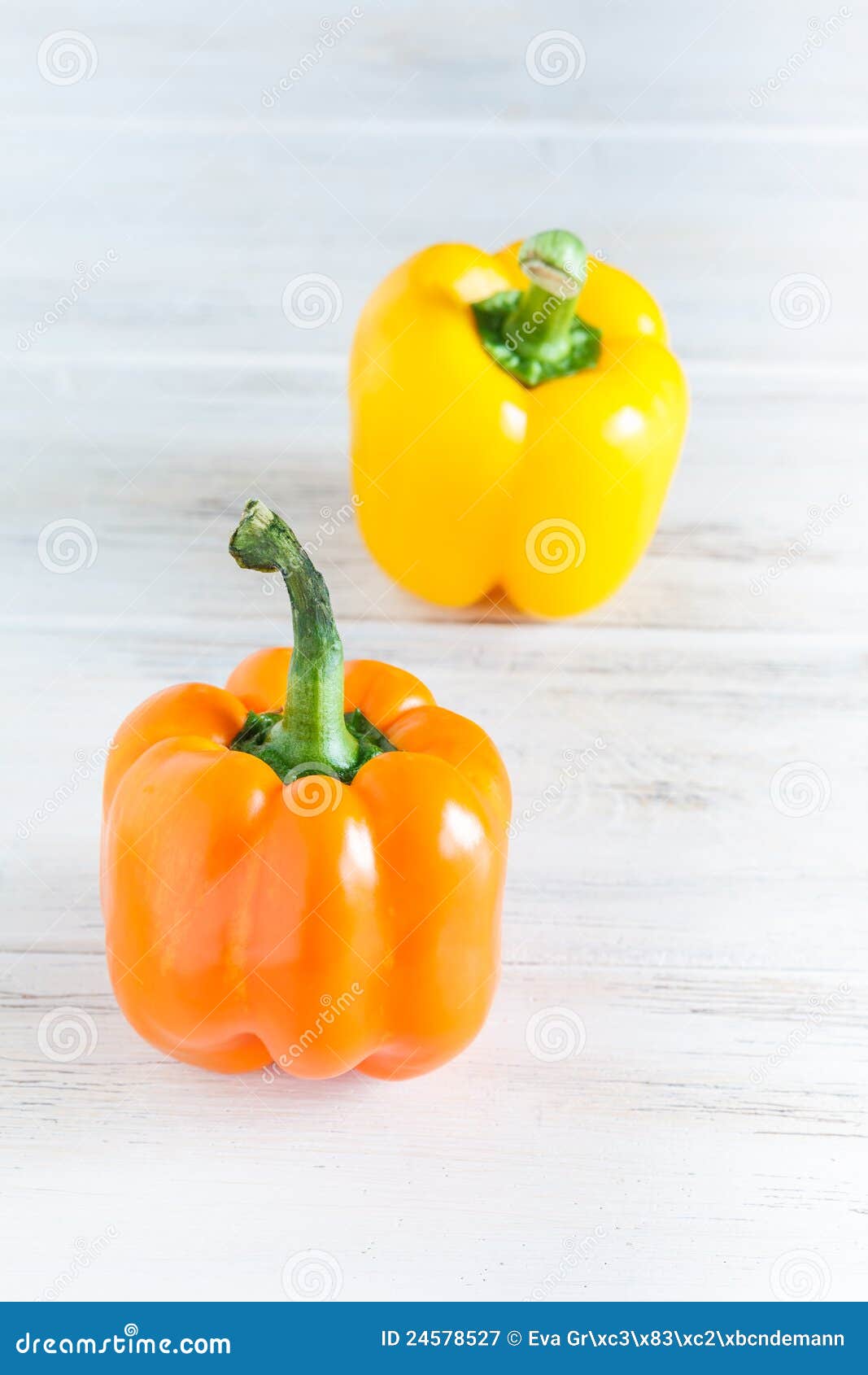 Orange and yellow pepper stock image. Image of eating 24578527