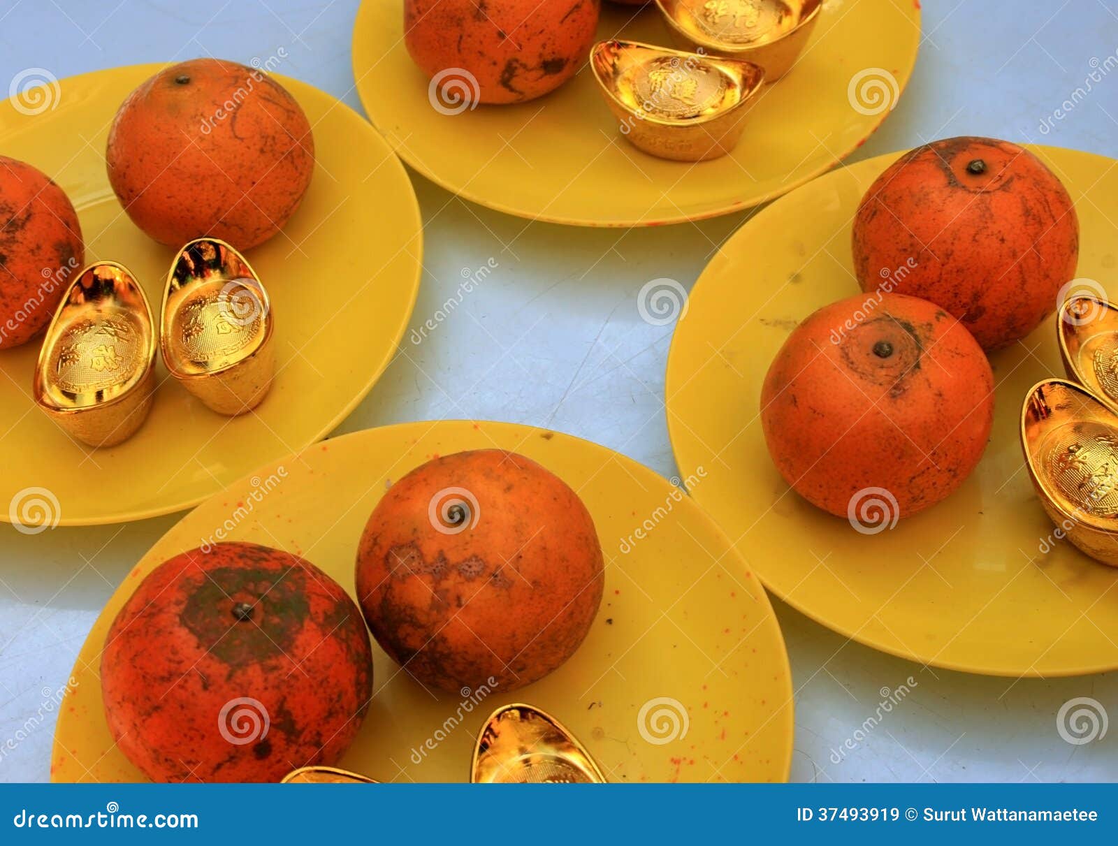 Oranges and gold ingot stock image. Image of background - 37493919
