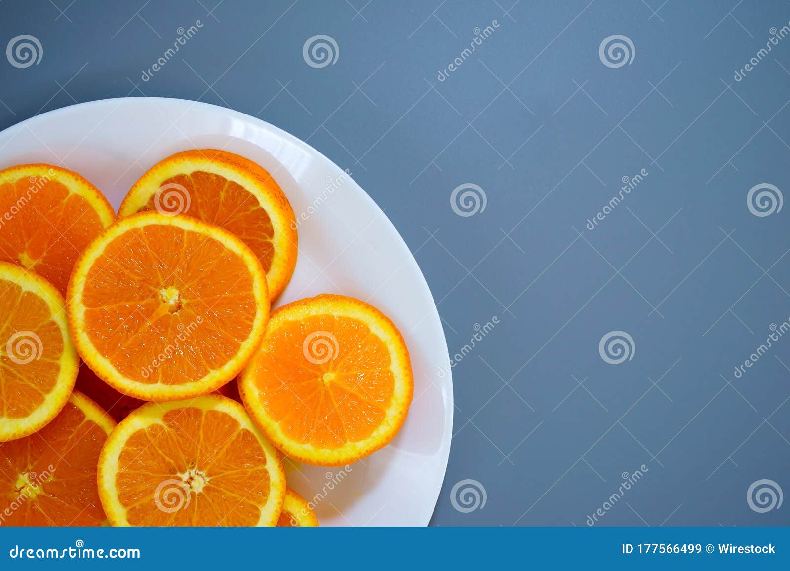 oranges on a plate on a sunny day