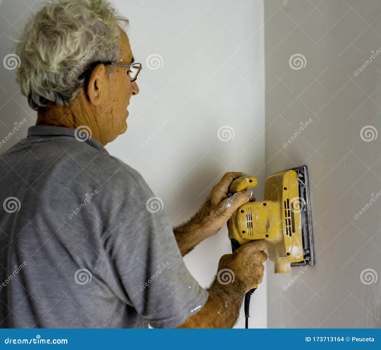 Orbital Sander Smoothes a Wall Stock Photo Image of glasses