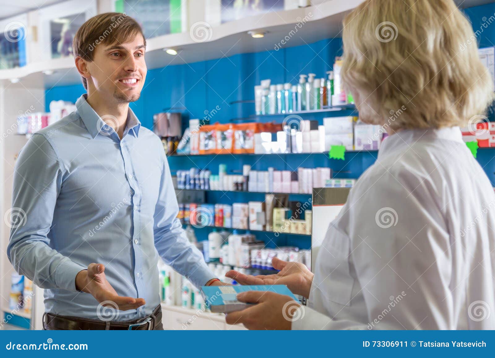 Ordinary Guy Talking To Pharmacist at Pharmacy Stock Image Image of