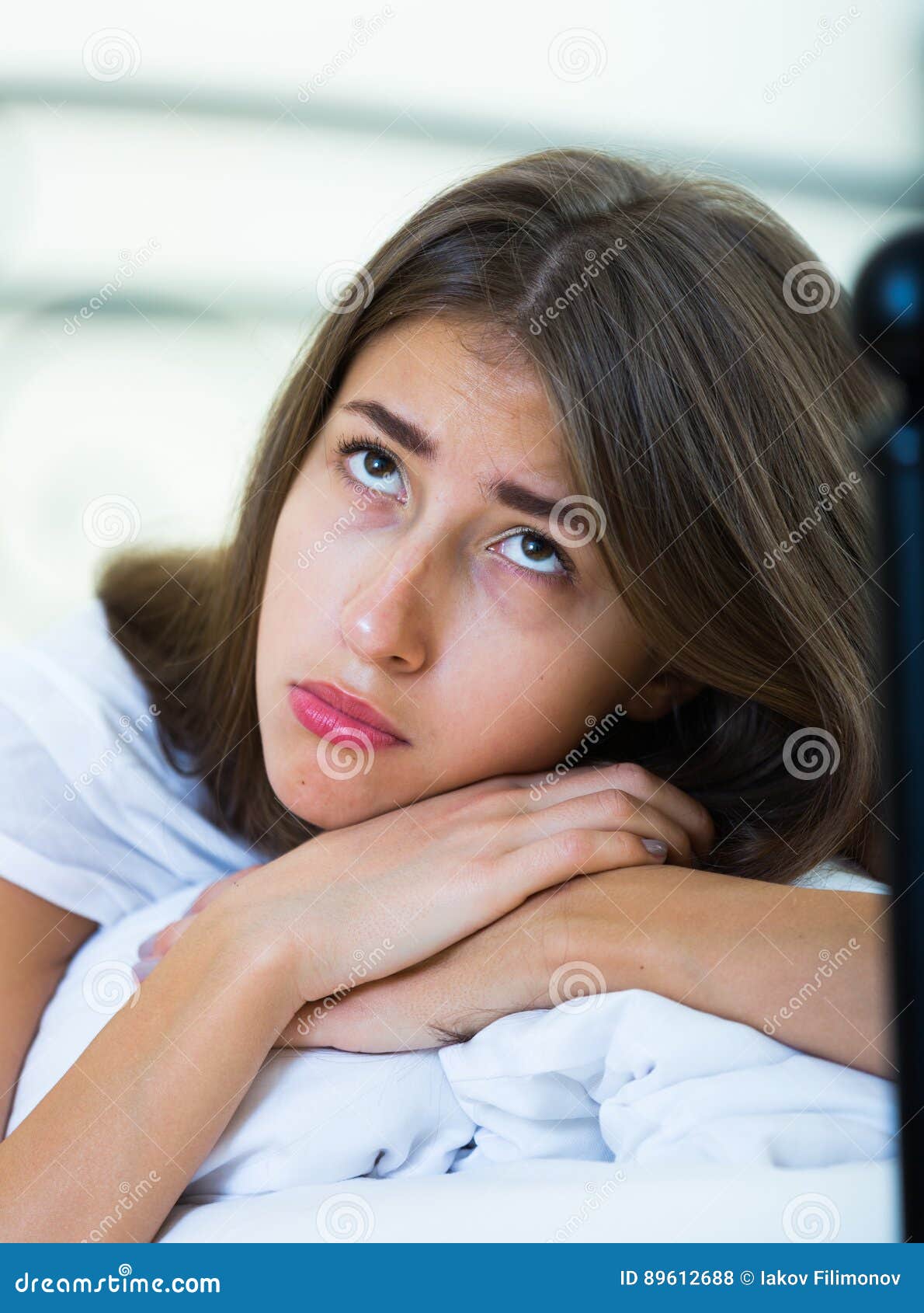 Ordinary Teenage Girl with Sad Look in Bed Stock Photo - Image of ...