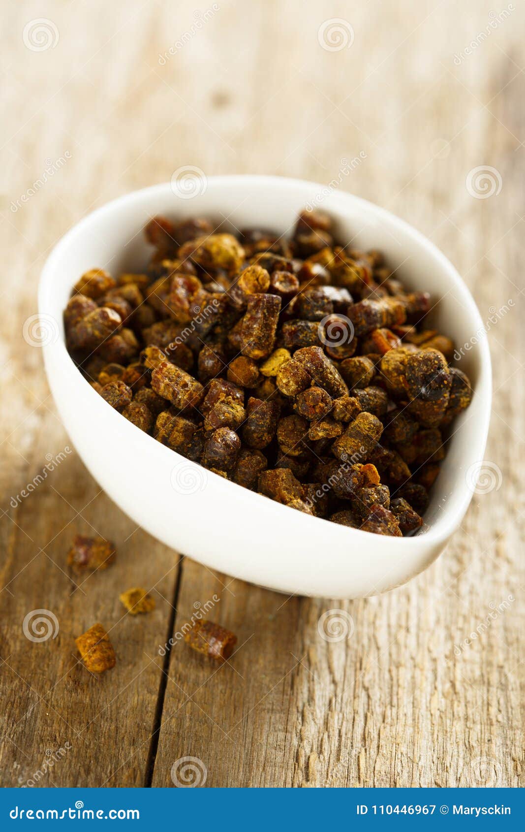 organic bee polen in a white bowl