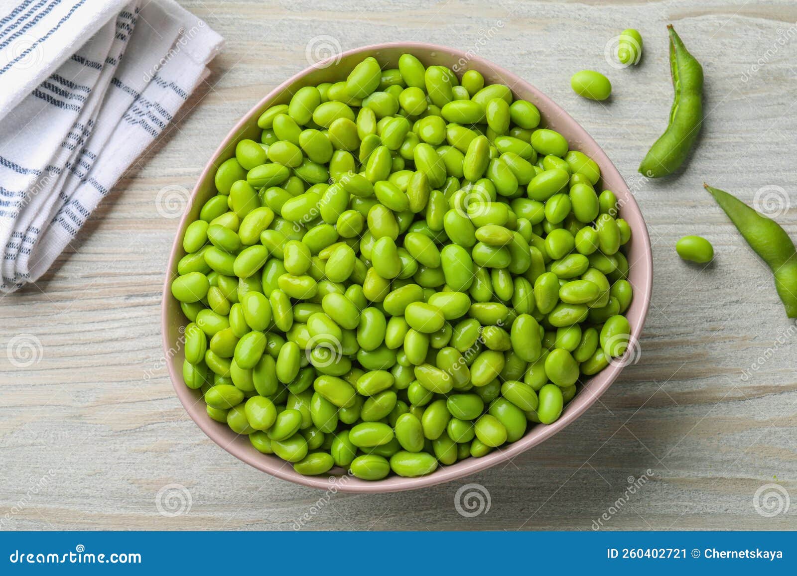 Organic Edamame Beans on Light Wooden Table, Flat Lay Stock Image