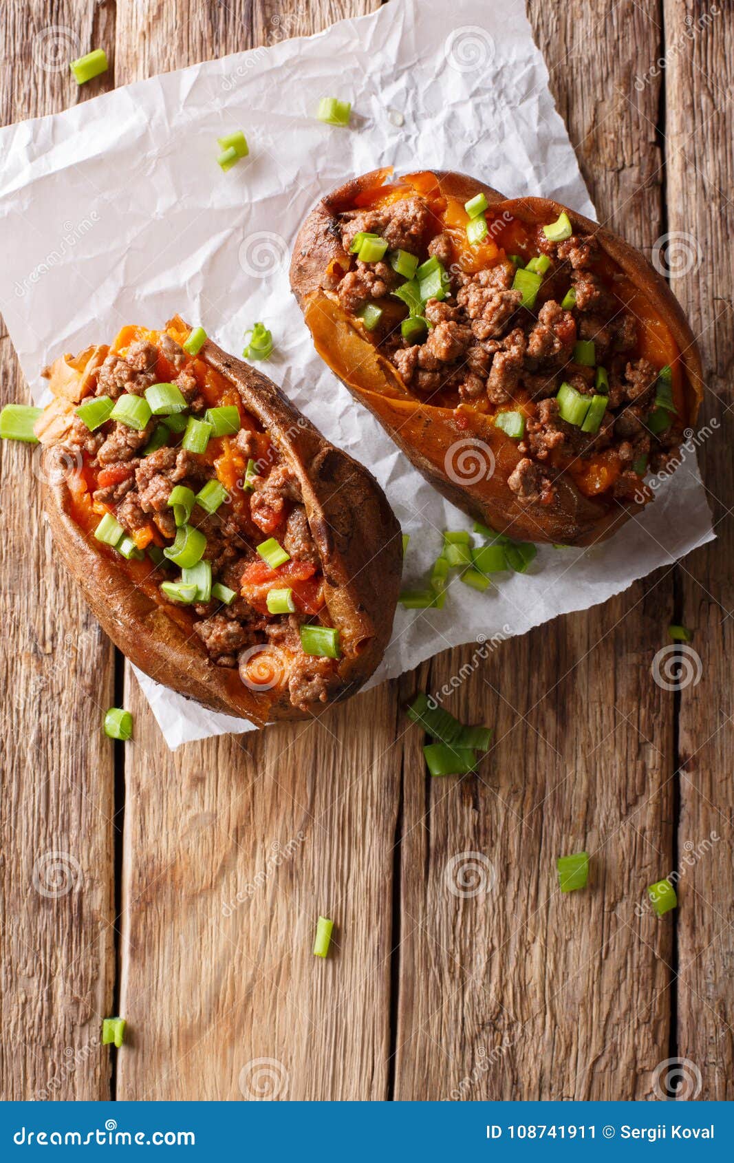 Organic Food: Baked Sweet Potato Stuffed with Ground Beef and Gr Stock