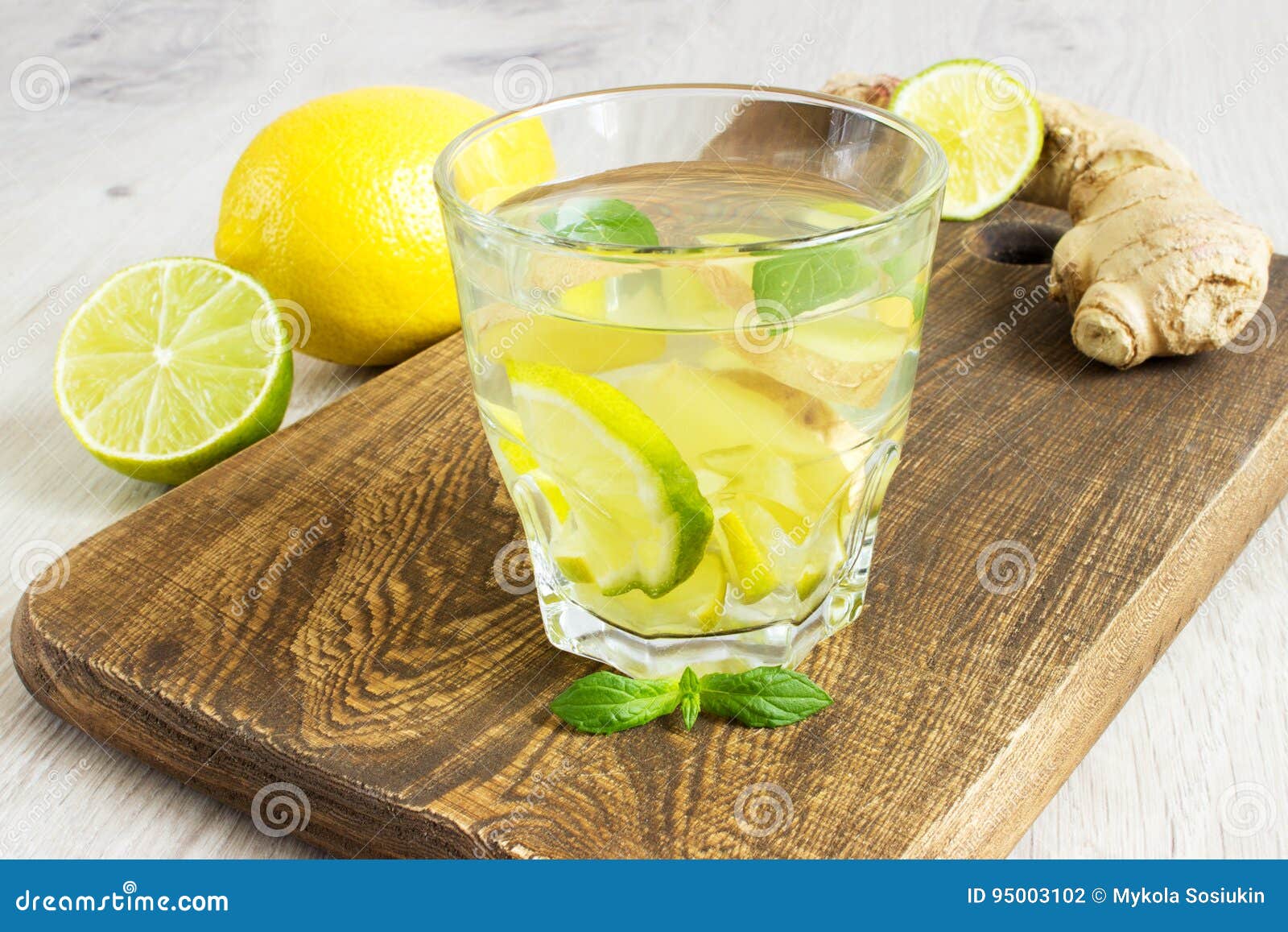 Organic Ginger Ale Soda in a Glass with Lemon and Lime Stock Photo