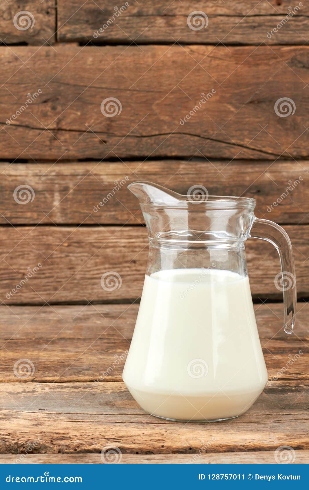 Organic Milk In Glass Jug Stock