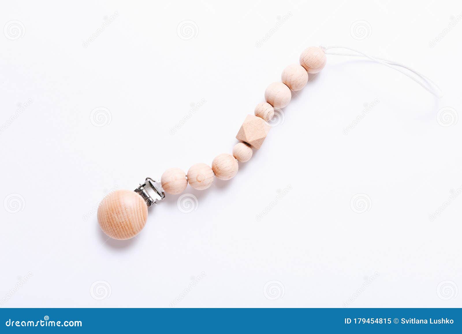 Organic Pacifier Clips on White Background. Newborn Accessory Stock