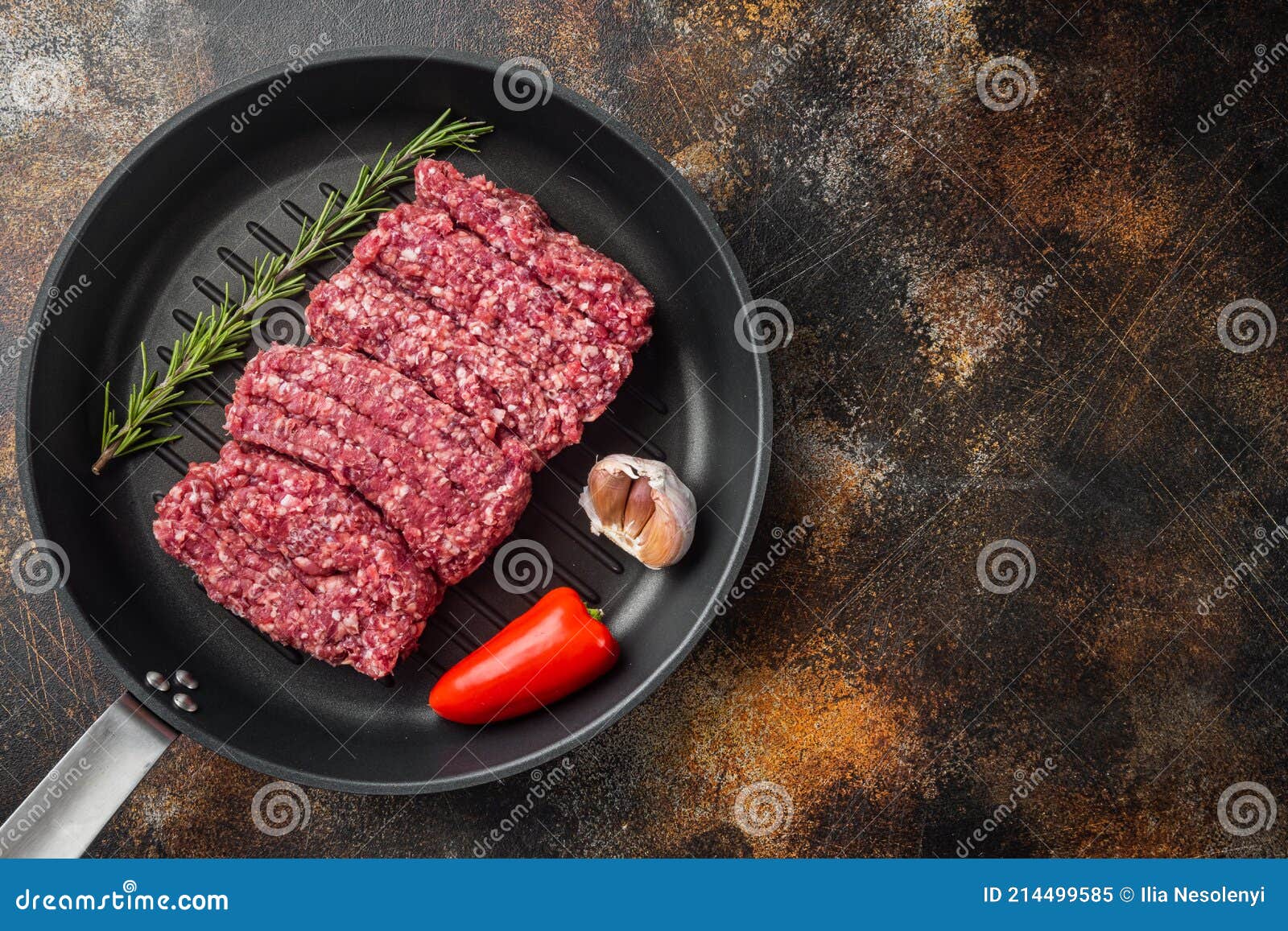 Organic Raw Grass Fed Ground Beef, on Old Dark Rustic Background, Top